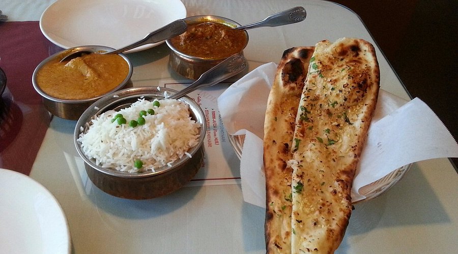 India Gate Restaurant signature dishes Butter ChickenGarlic NaanVegetable Korma